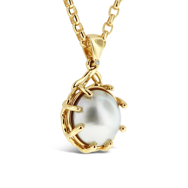 Mabe pearl and diamond pendant in 18k yellow gold