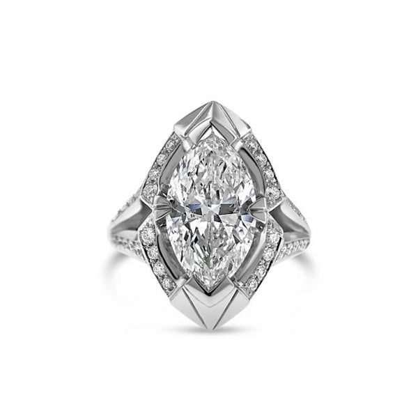 Marquise and round diamond ring in 18k white gold